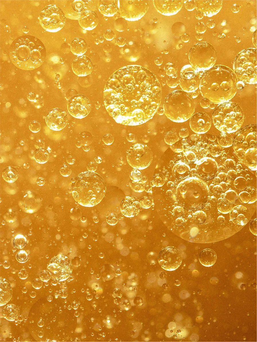 Golden oil bubbles, the oil phase of the two-phase makeup remover